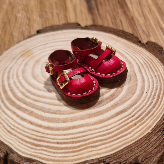 Miniature shoes red