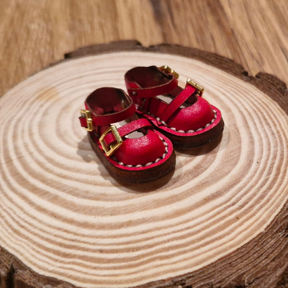 Miniature shoes red