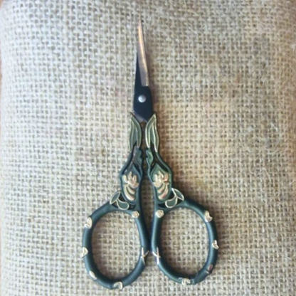 Green little scissors