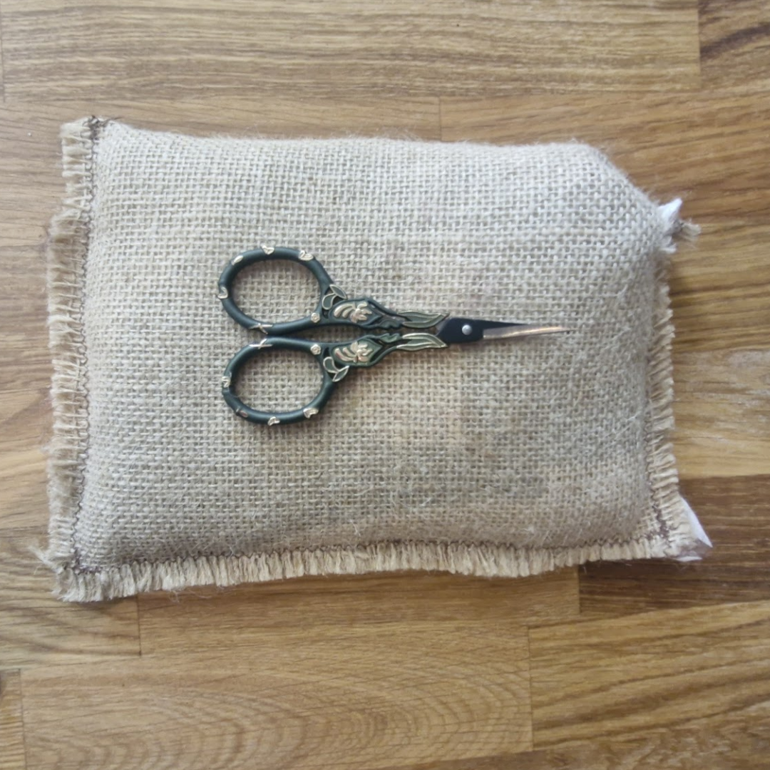 Green little scissors